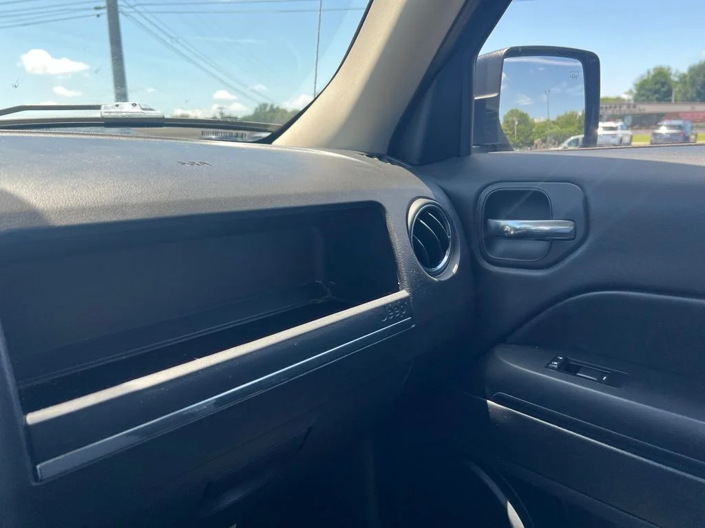 Used 2015 Billet Silver Metallic Clearcoat Jeep Sport image 14