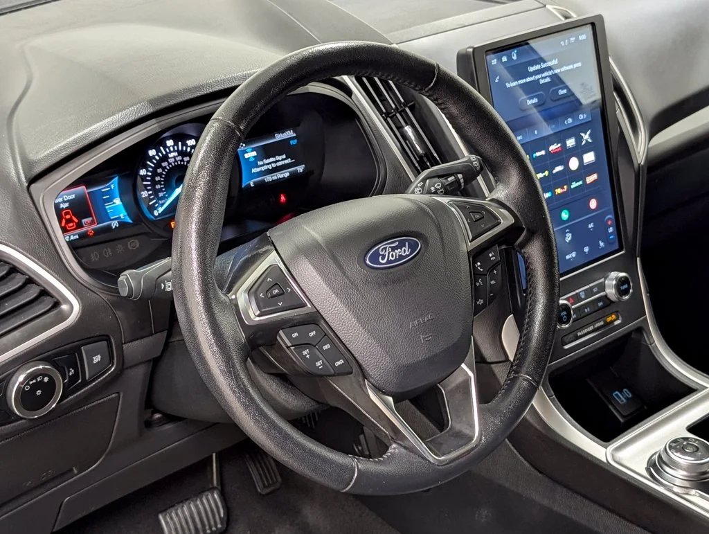 Certified Used 2024 Agate Black Metallic Ford SEL image 9