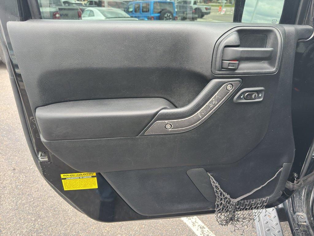 Used 2011 Black Clearcoat Jeep Sport image 15