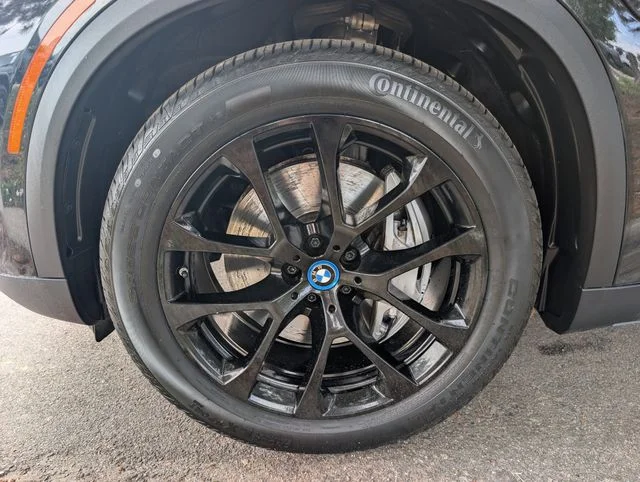 Used 2025 Black Sapphire Metallic BMW xDrive50e image 7