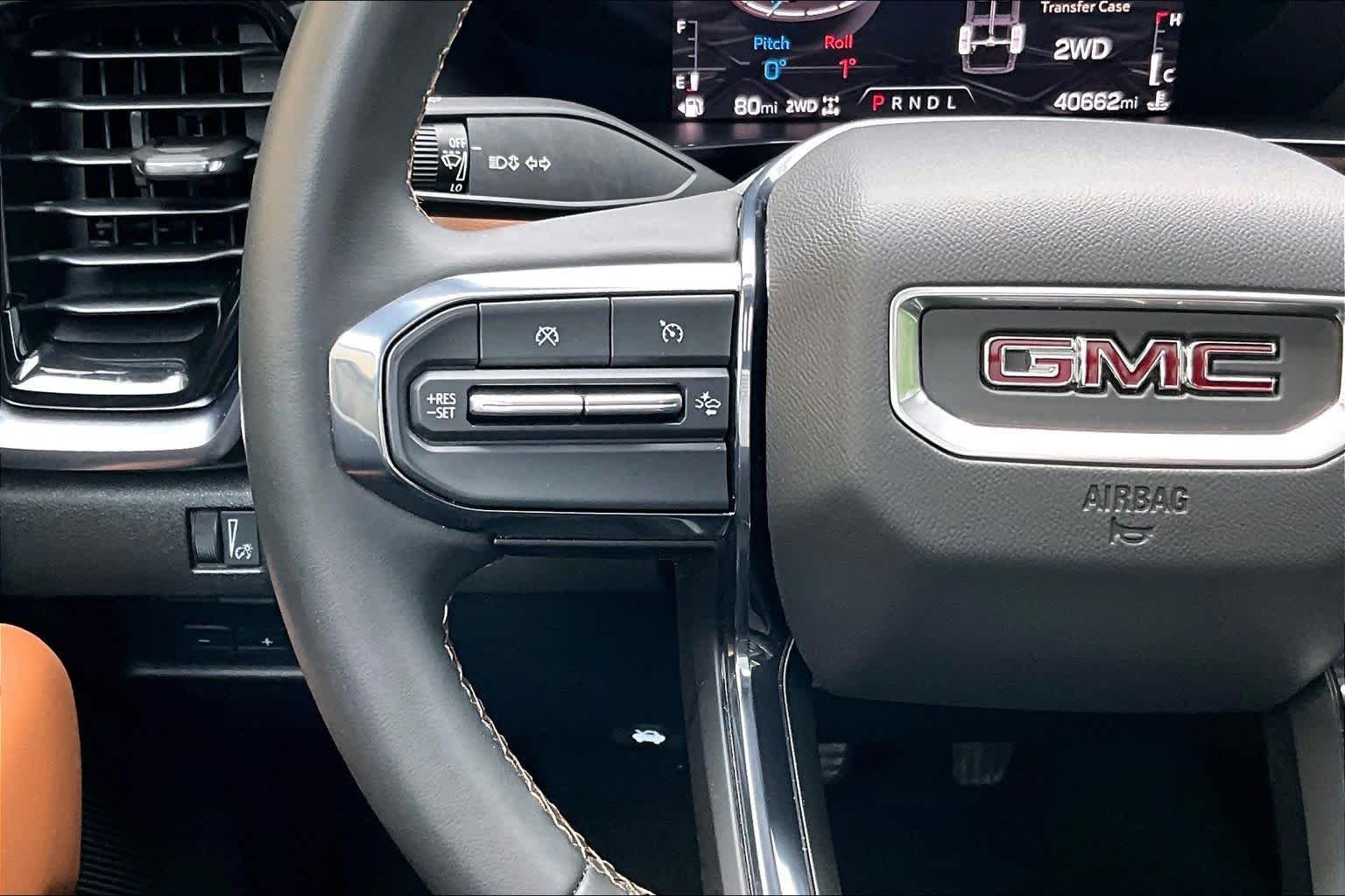 Used 2023 Deep Bronze Metallic GMC 4WD AT4 image 24