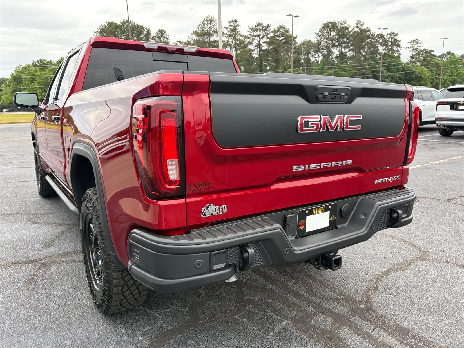 Used 2026 Volcanic Red Tintcoat GMC AT4X image 13