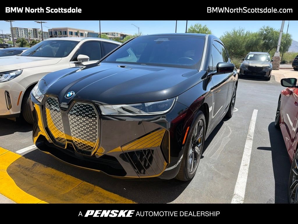 Certified Used 2024 Black Sapphire Metallic BMW xDrive50 image 1