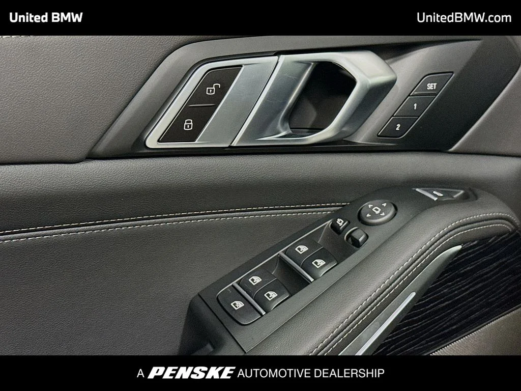 New 2026 Mineral White Metallic BMW xDrive50e image 3
