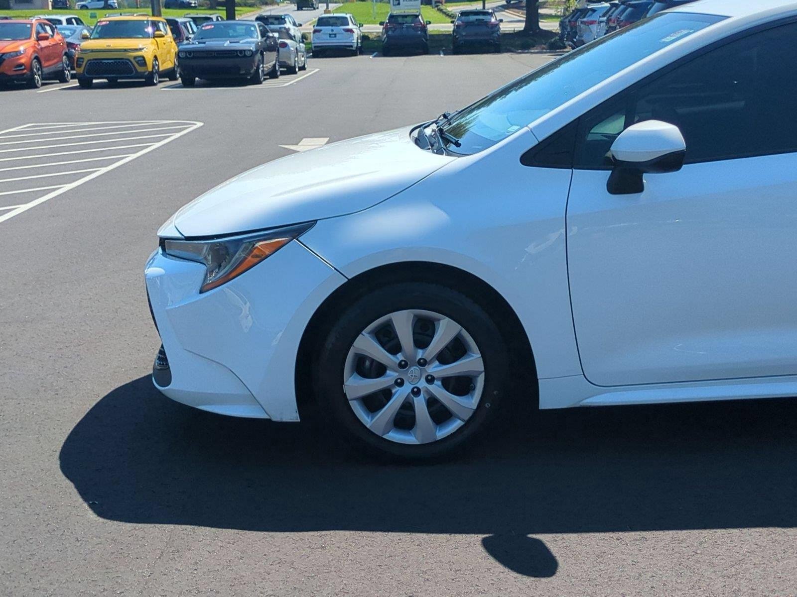 Used 2021 Super White Toyota LE image 10