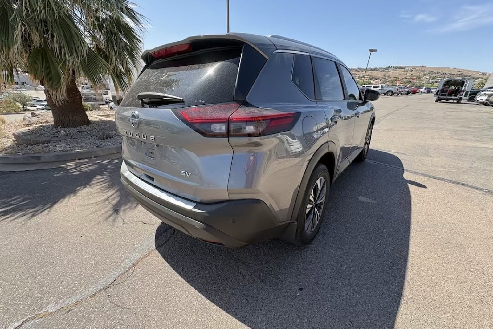 Used 2023 Gun Metallic Nissan SV image 6