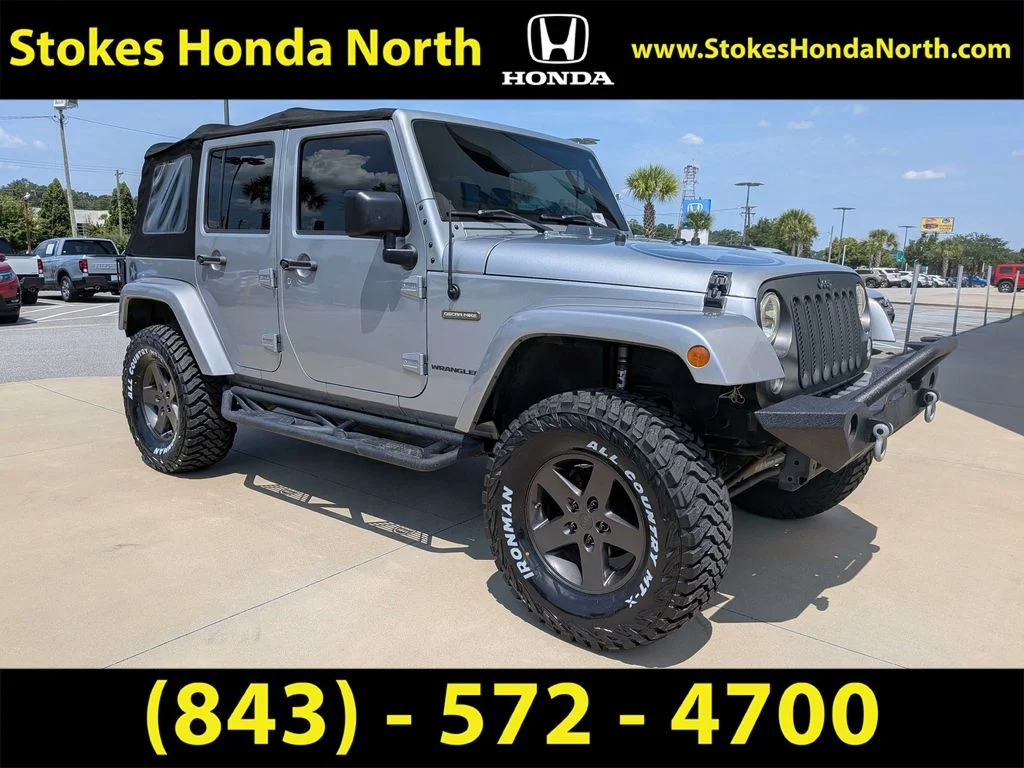 Used 2016 Silver Jeep Unlimited Sport S image 2