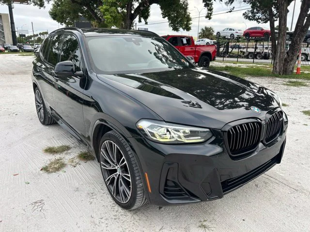 Used 2022 Black Sapphire Metallic BMW xDrive30i image 1