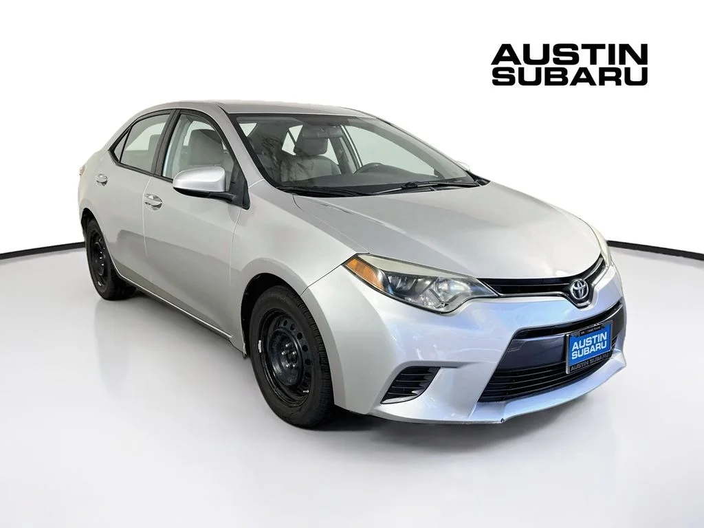 Used 2015 Silver Toyota LE image 1