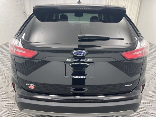 Used 2022 Agate Black Metallic Ford SEL image 7