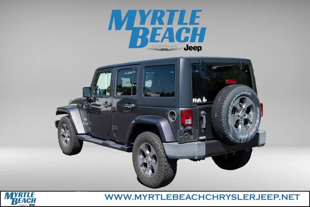 Used 2018 Granite Crystal Metallic Clearcoat Jeep Unlimited Sahara image 4