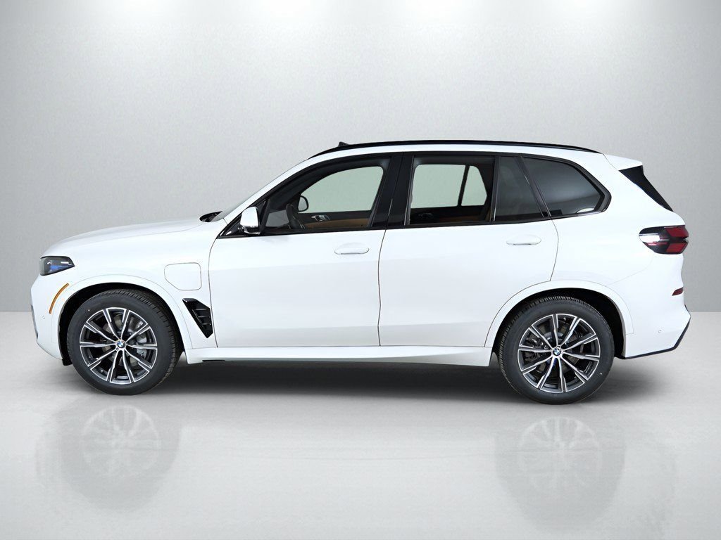 Used 2026 Mineral White Metallic BMW xDrive50e image 16