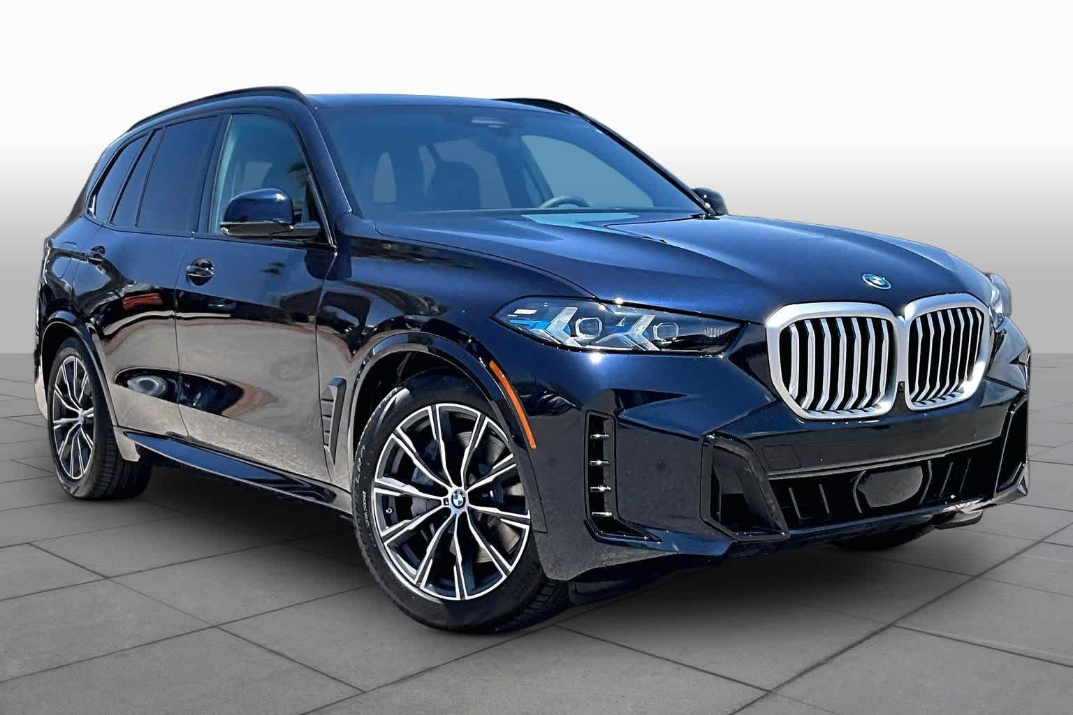 New 2026 Carbon Black Metallic BMW xDrive50e image 2