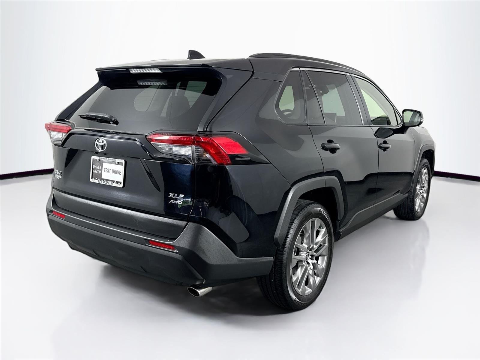 Used 2025 Midnight Black Metallic Toyota XLE Premium image 2
