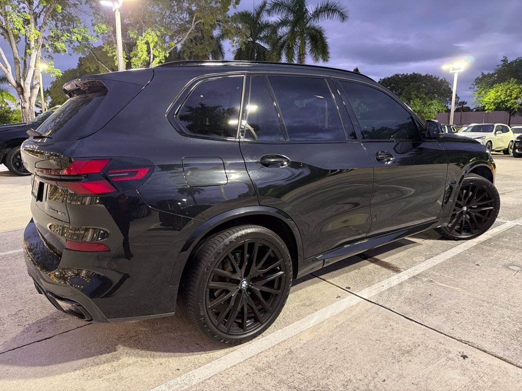 Certified Used 2024 Black Sapphire Metallic BMW xDrive40i image 4