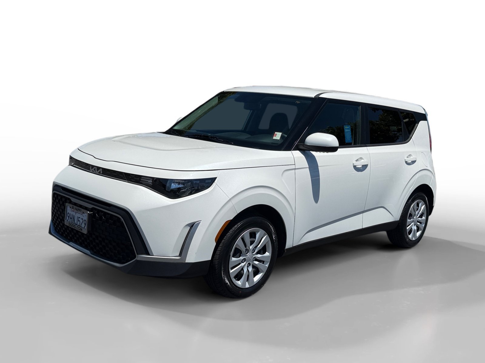Used 2023 Snow White Pearl Kia LX image 1