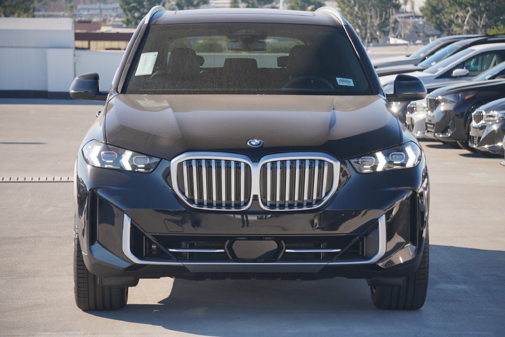 Used 2026 Black Sapphire Metallic BMW xDrive50e image 2