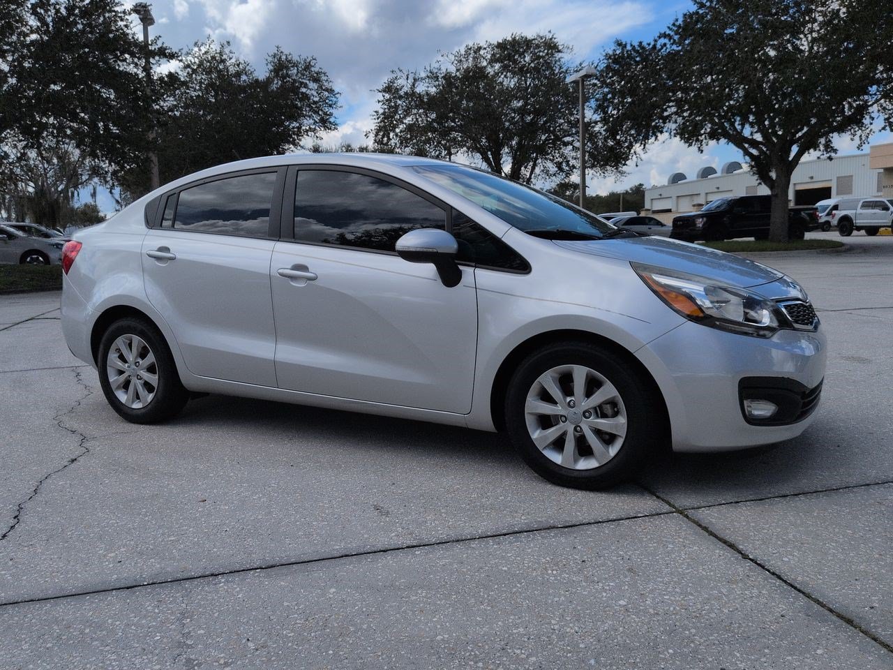 Used 2014 Bright Silver Kia EX image 1