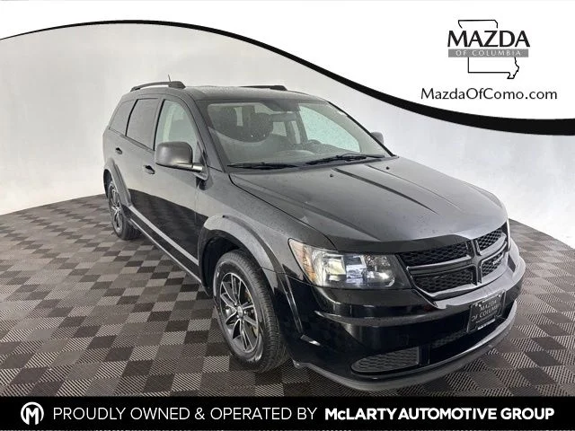 Used 2017 Black Dodge SE image 1