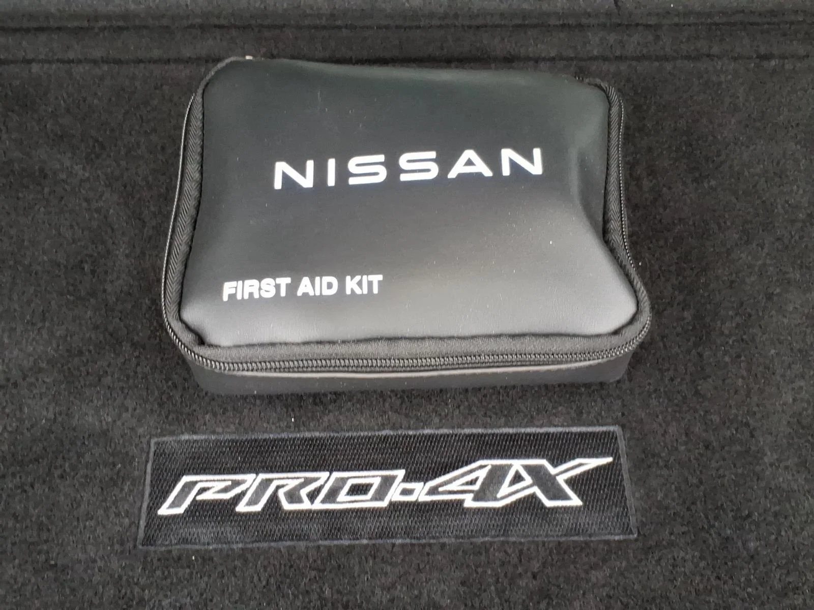 Used 2025 Aspen White Tricoat/Super Black Nissan PRO-4X image 26