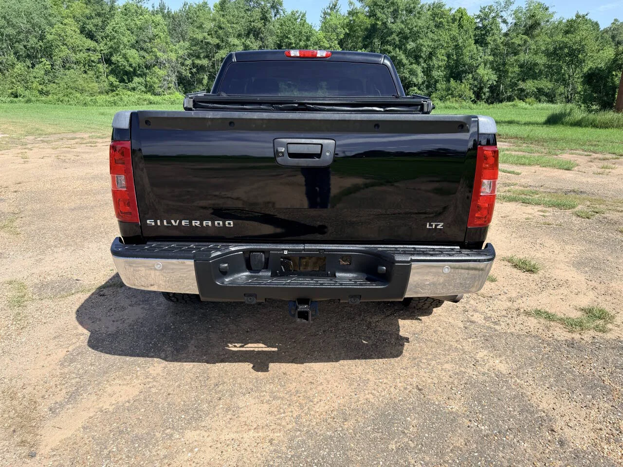 Used 2013 Black Chevrolet LTZ 4x4 4dr Crew Cab 5.8 ft. SB image 4