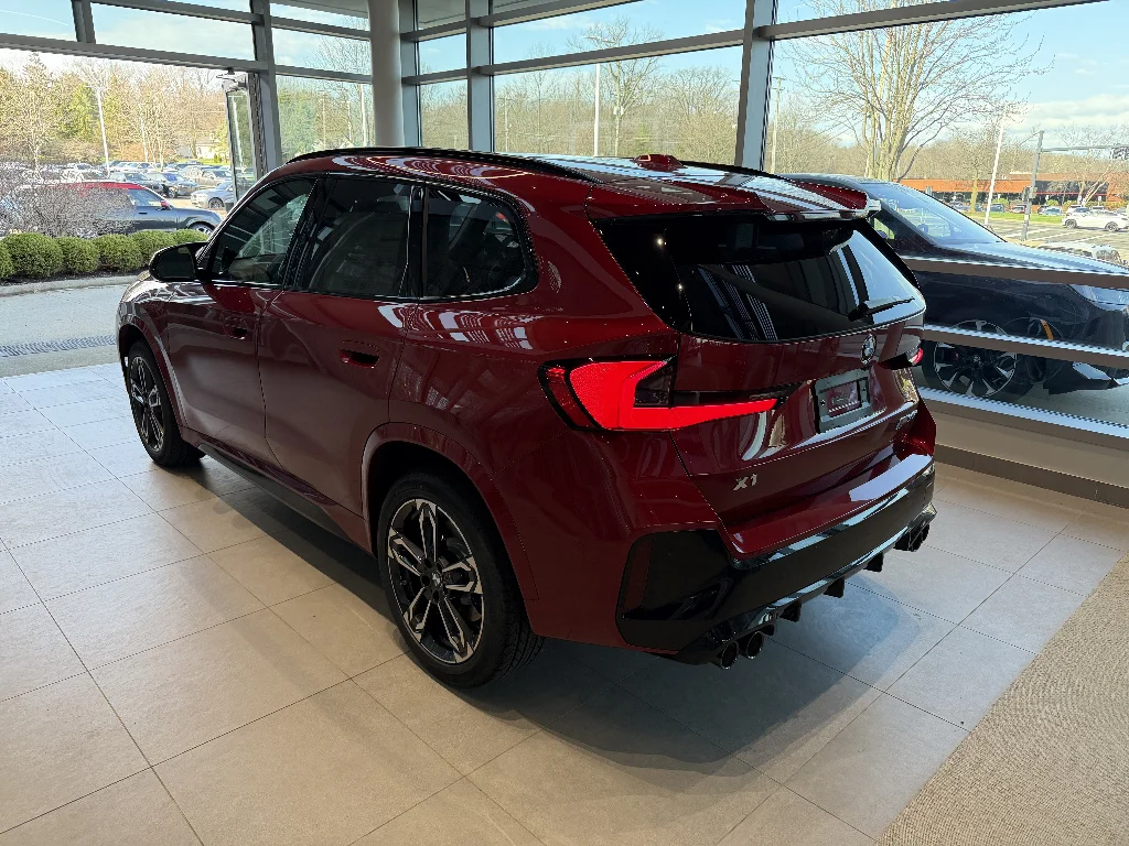 New 2026 Vegas Red Metallic BMW M35i image 4