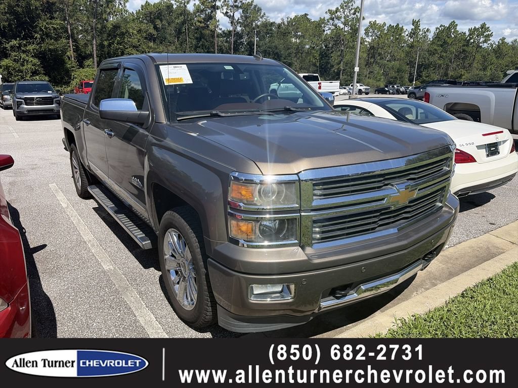 Used 2014 BROWNSTONE METALLIC Chevrolet High Country image 1