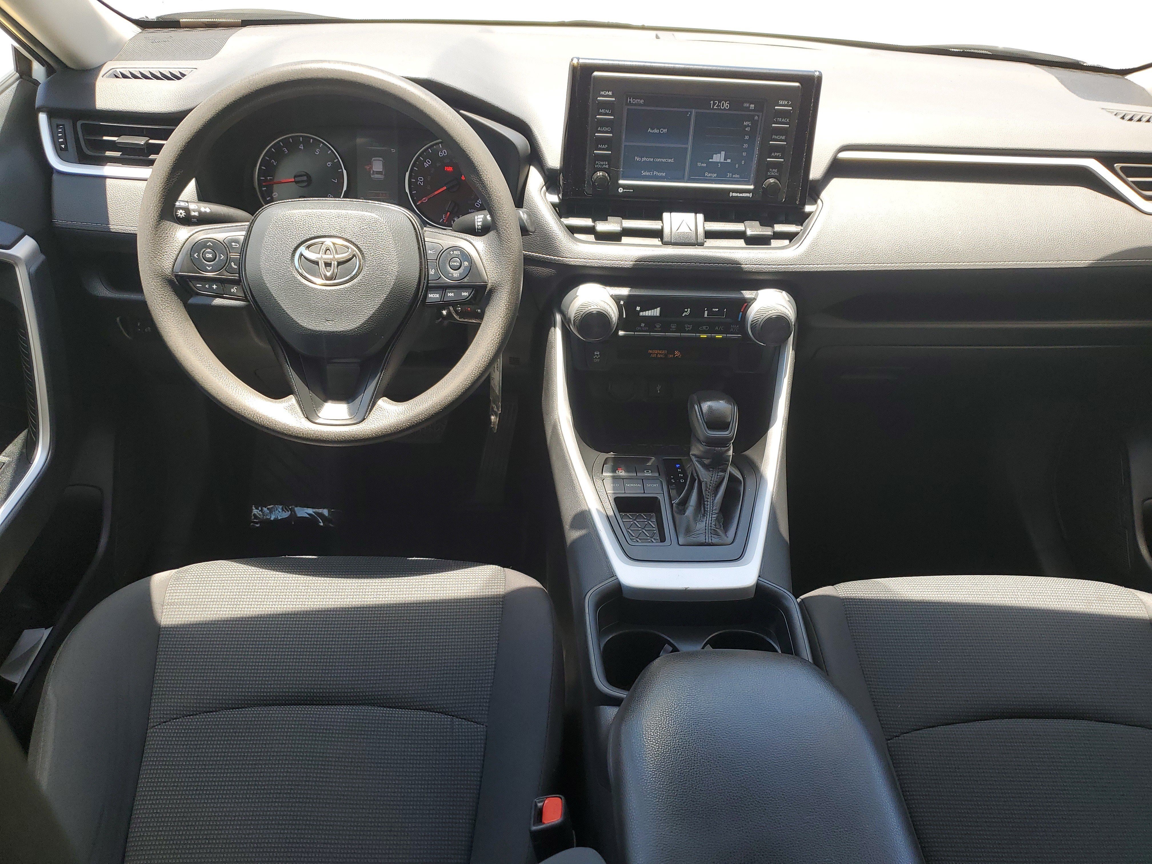 Used 2021 Super White Toyota LE image 13