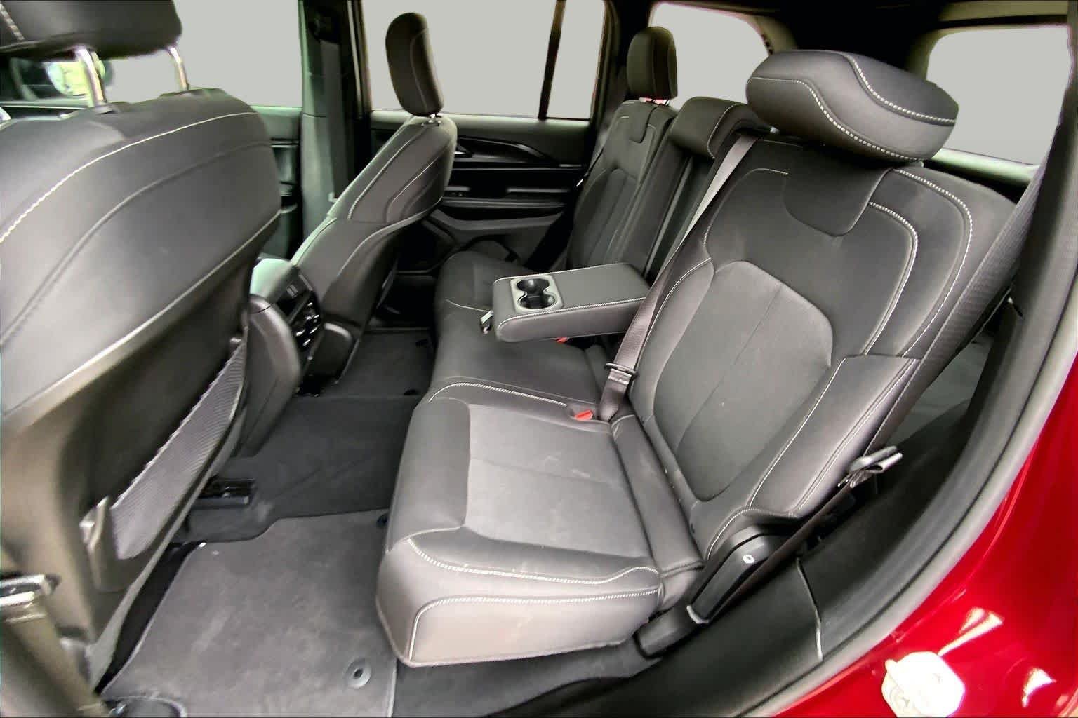 Used 2025 Velvet Red Pearlcoat Jeep Laredo image 21