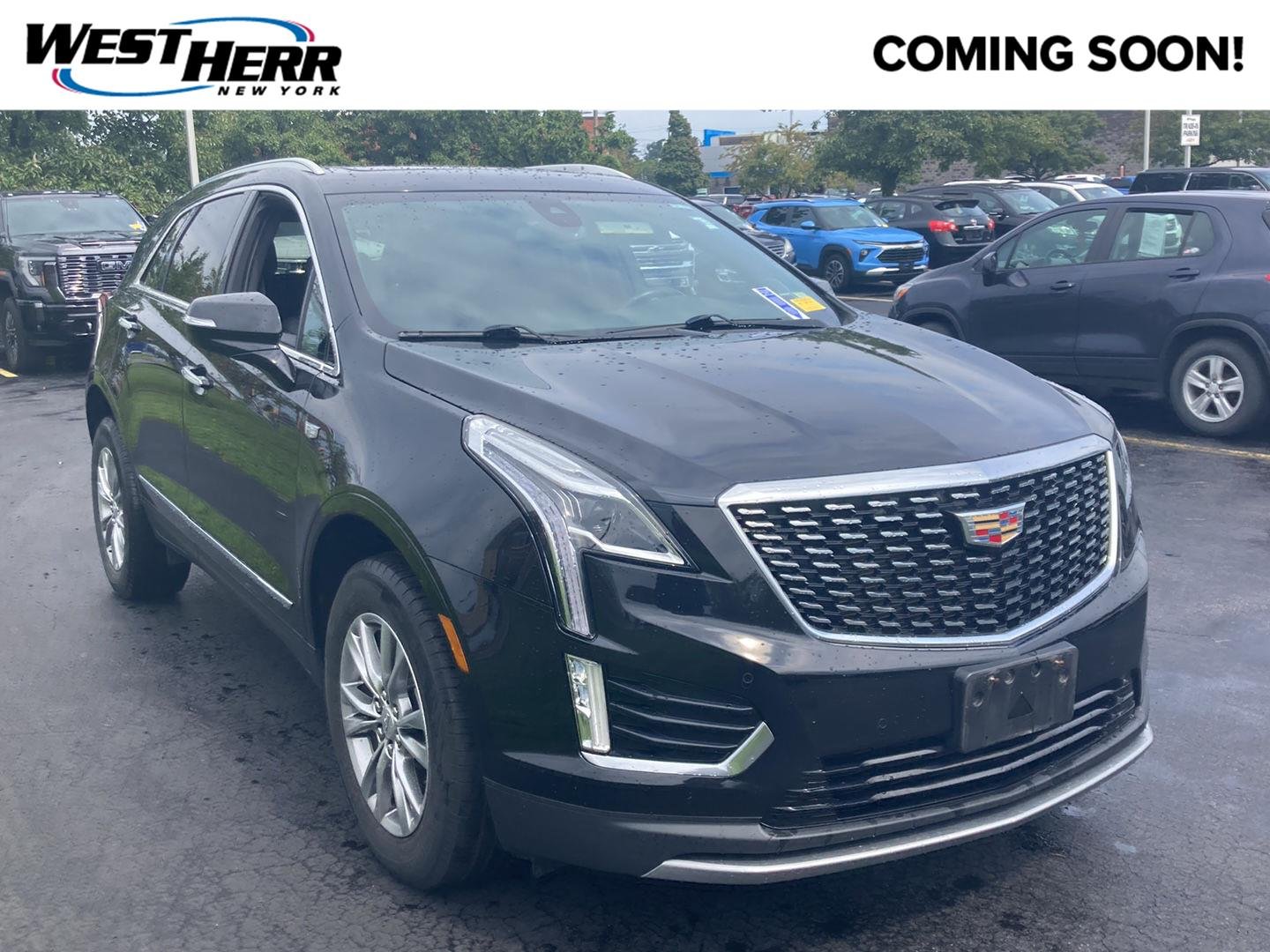 Used 2023 Stellar Black Metallic Cadillac AWD Premium Luxury image 1