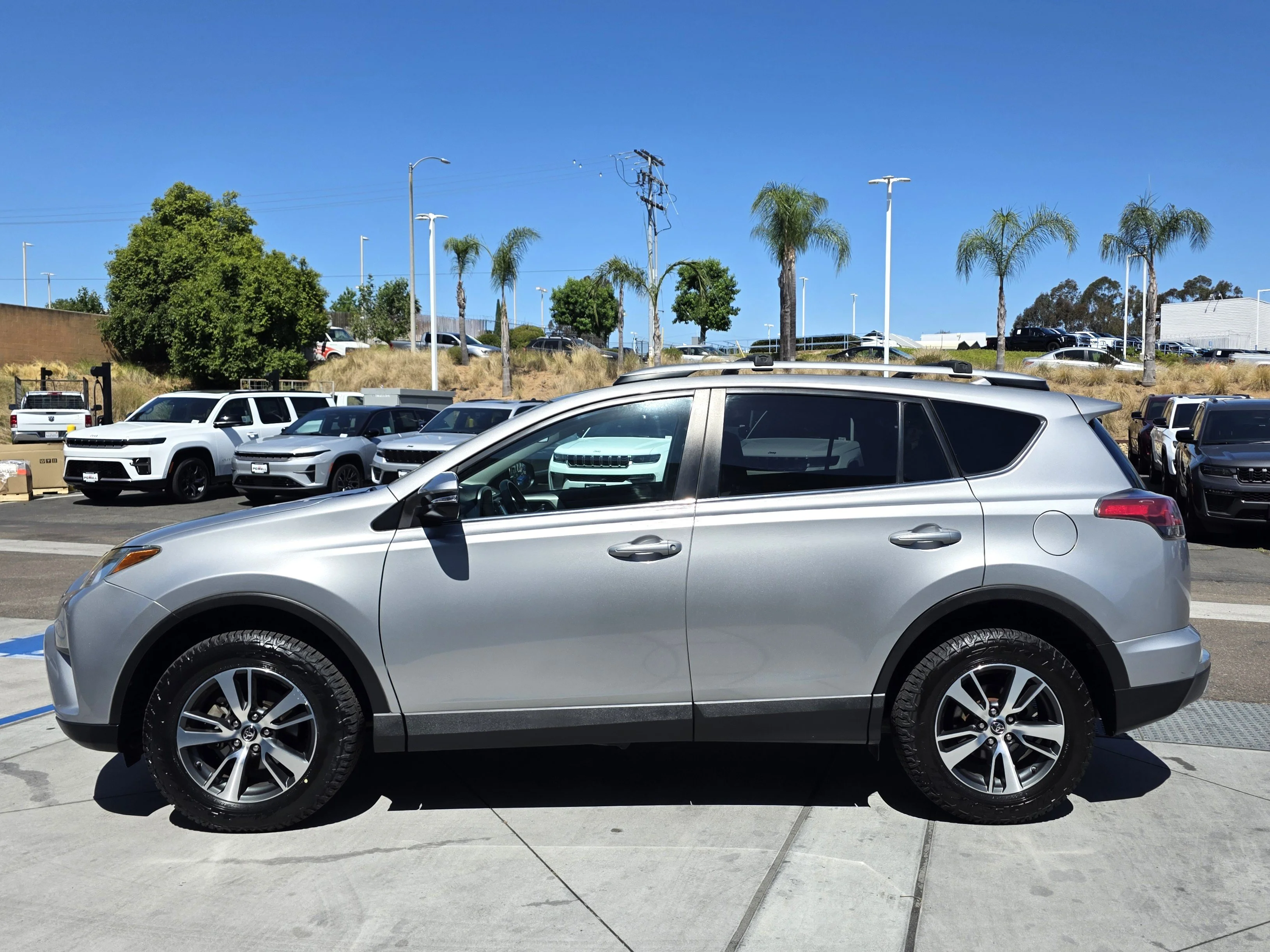 Used 2016 Silver Sky Metallic Toyota XLE image 3