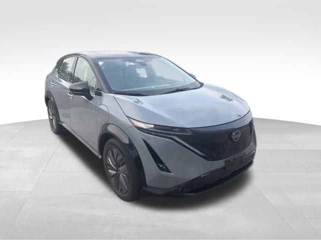 Used 2024 Gray Nissan EVOLVE+ e-4ORCE image 2