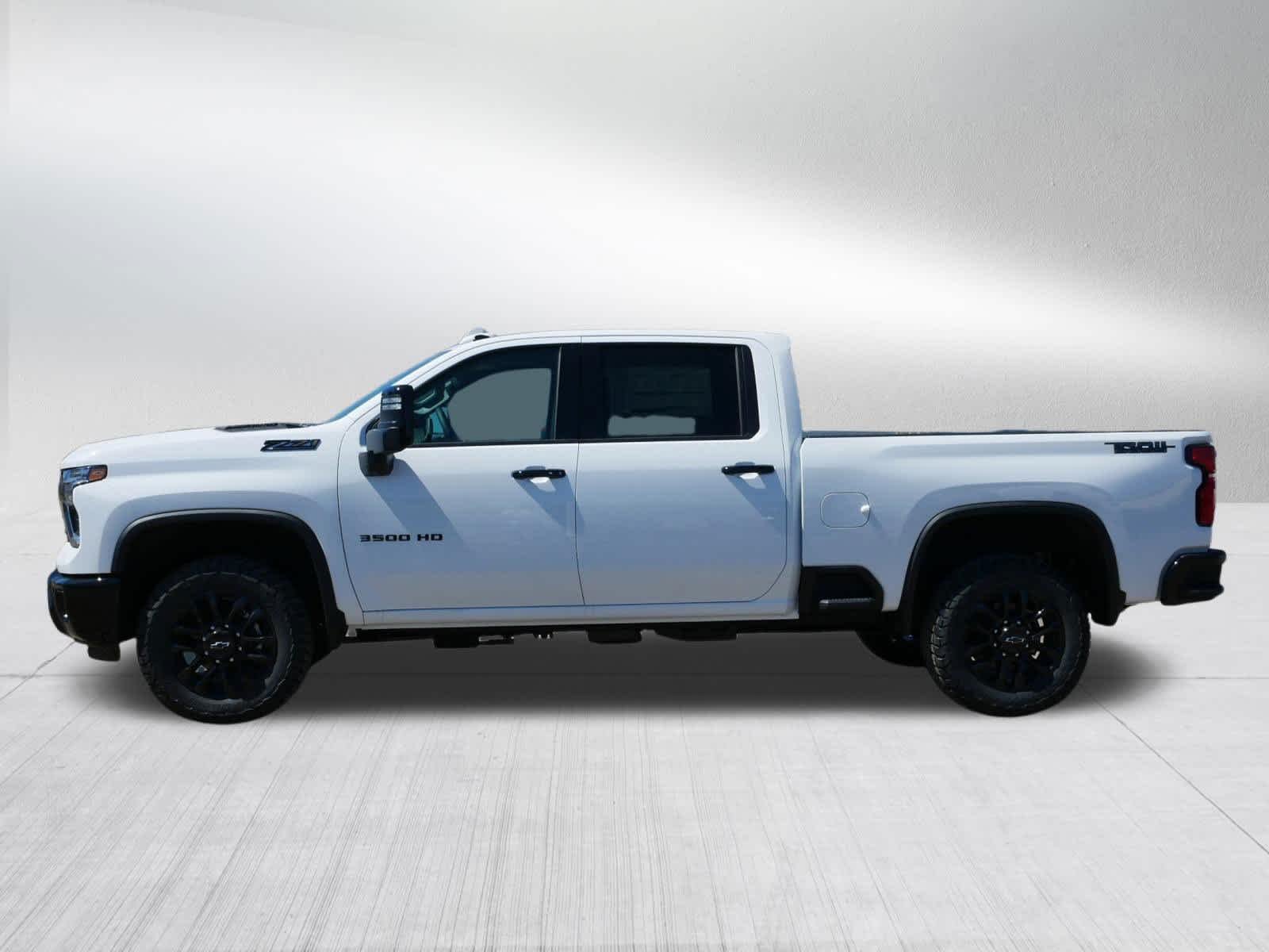 New 2026 Summit White Chevrolet LTZ image 2