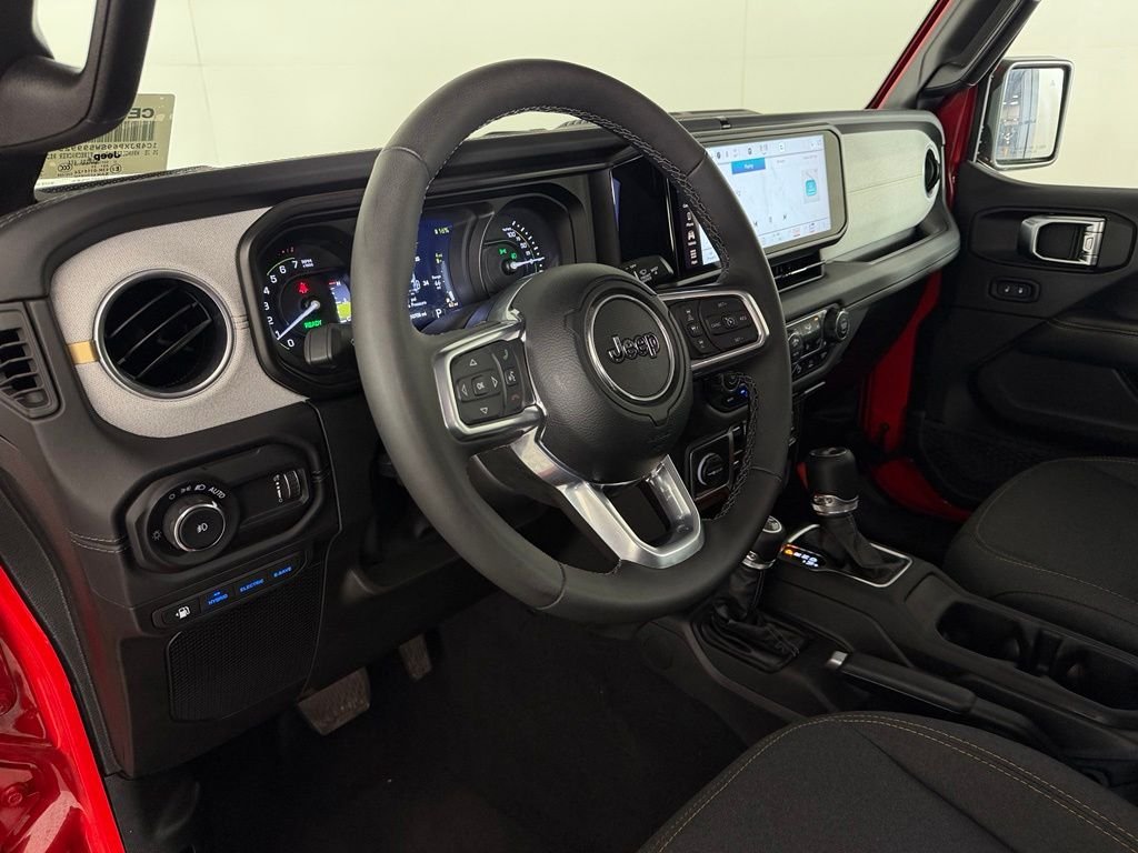 Certified Used 2025 Red Jeep Sahara 4xe image 12