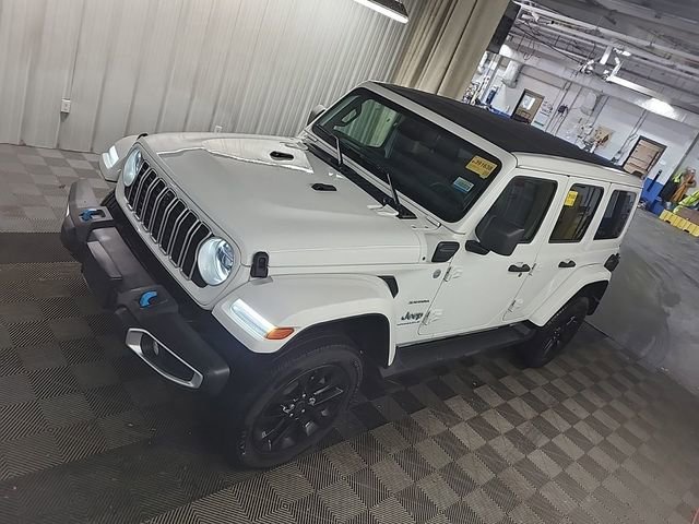 Used 2024 Bright White Clearcoat Jeep Sahara image 1