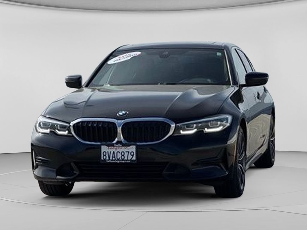 Used 2021 Black Sapphire Metallic BMW 330e iPerformance image 6