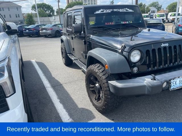 Used 2017 Black Jeep Unlimited Sport image 1