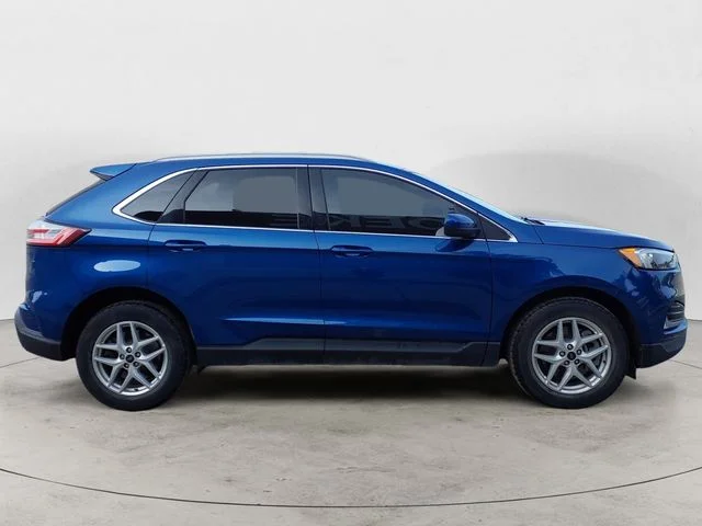 Used 2023 Blue Metallic Ford SEL image 4