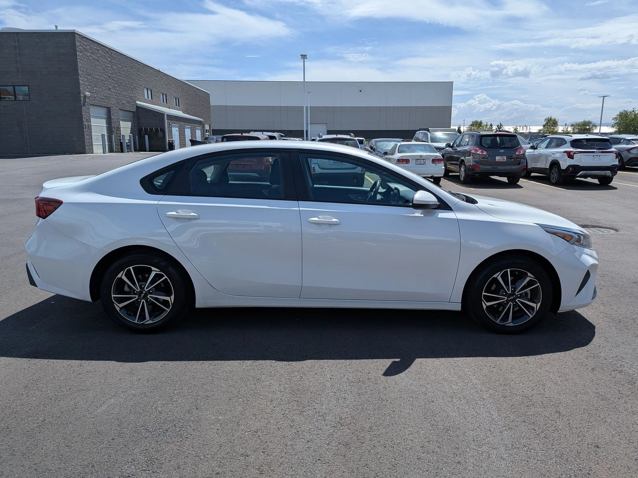 Used 2023 Snow White Pearl Kia LXS image 6