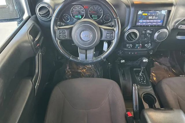 Used 2015 Black Clearcoat Jeep Unlimited Sport image 17