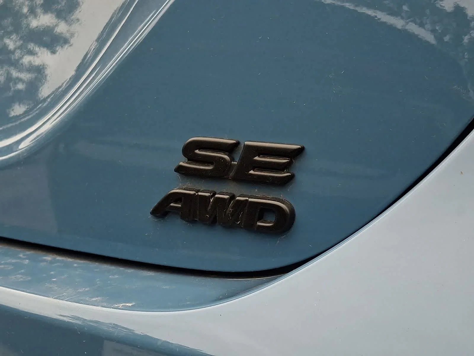 Used 2024 Cavalry Blue Toyota SE image 7