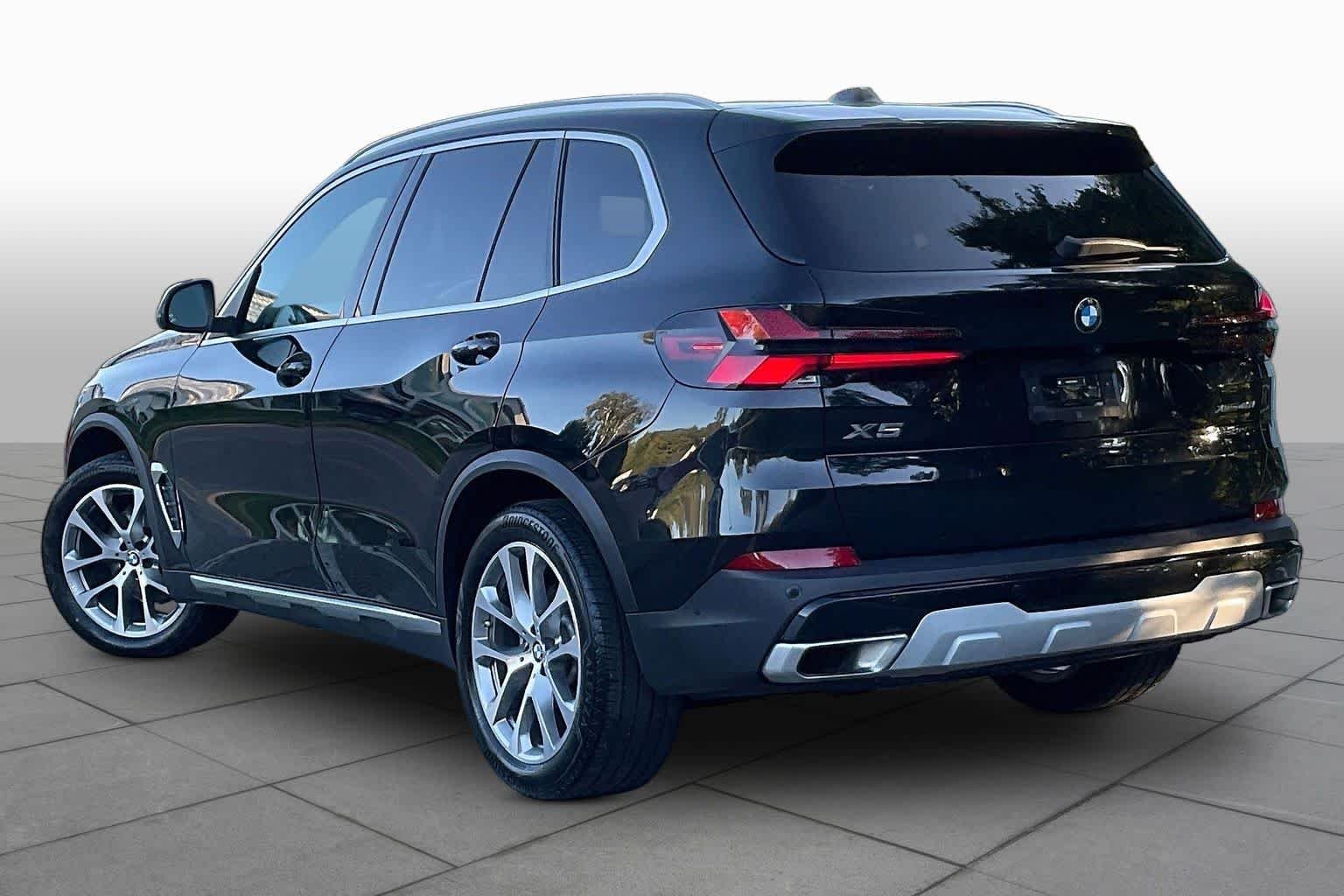 Certified Used 2024 Black Sapphire Metallic BMW xDrive40i image 11