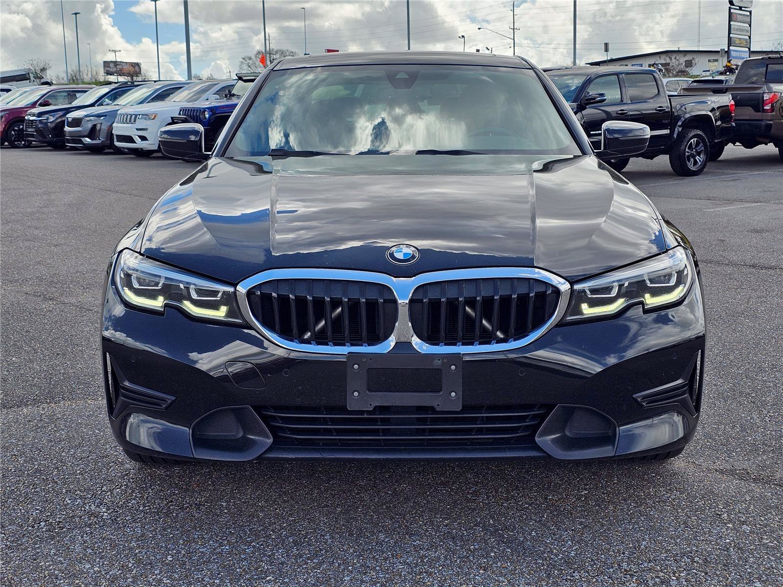 Used 2022 Black Sapphire Metallic BMW 330i xDrive image 2