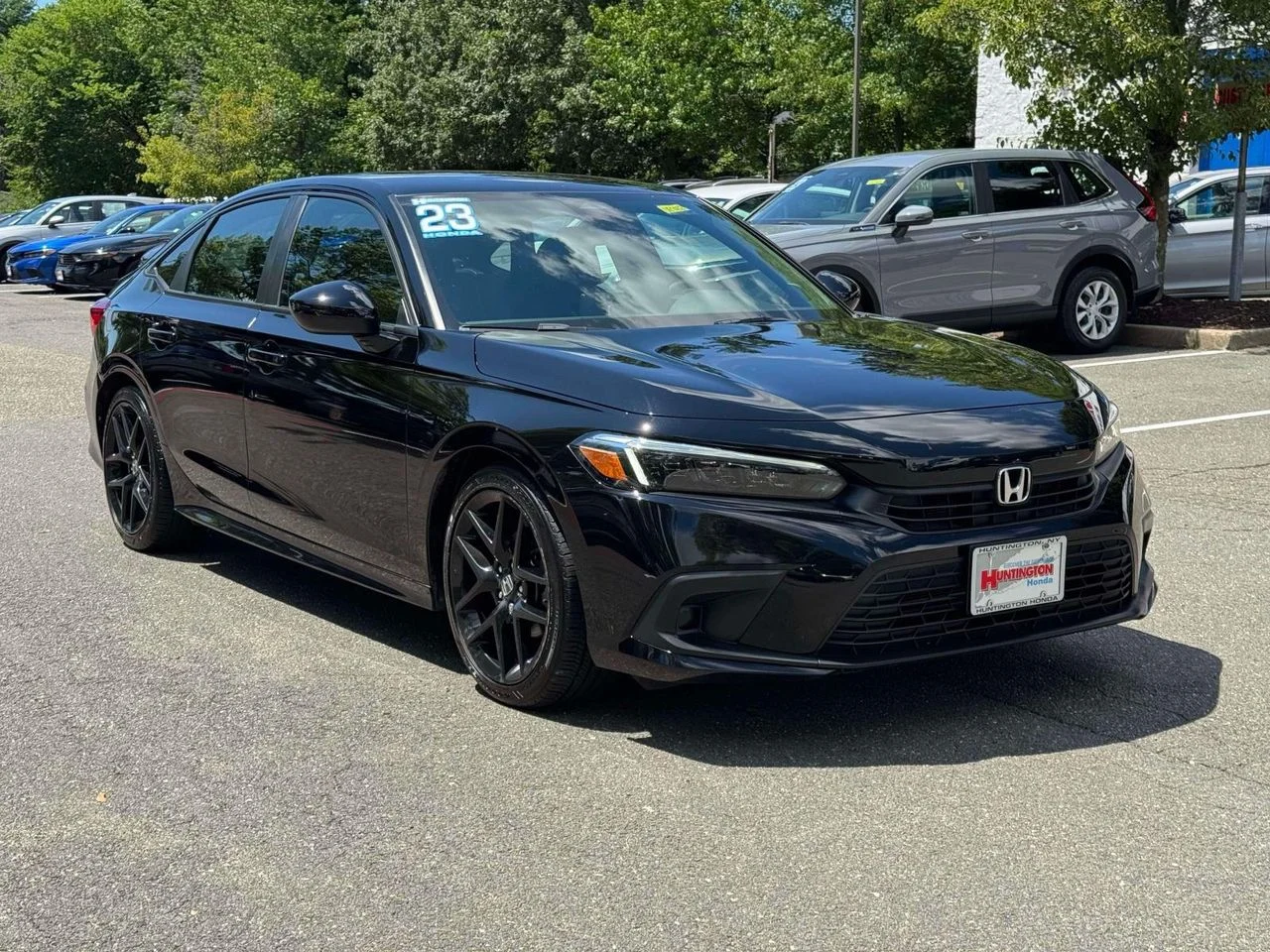 Certified Used 2023 Crystal Black Pearl Honda Sport image 1