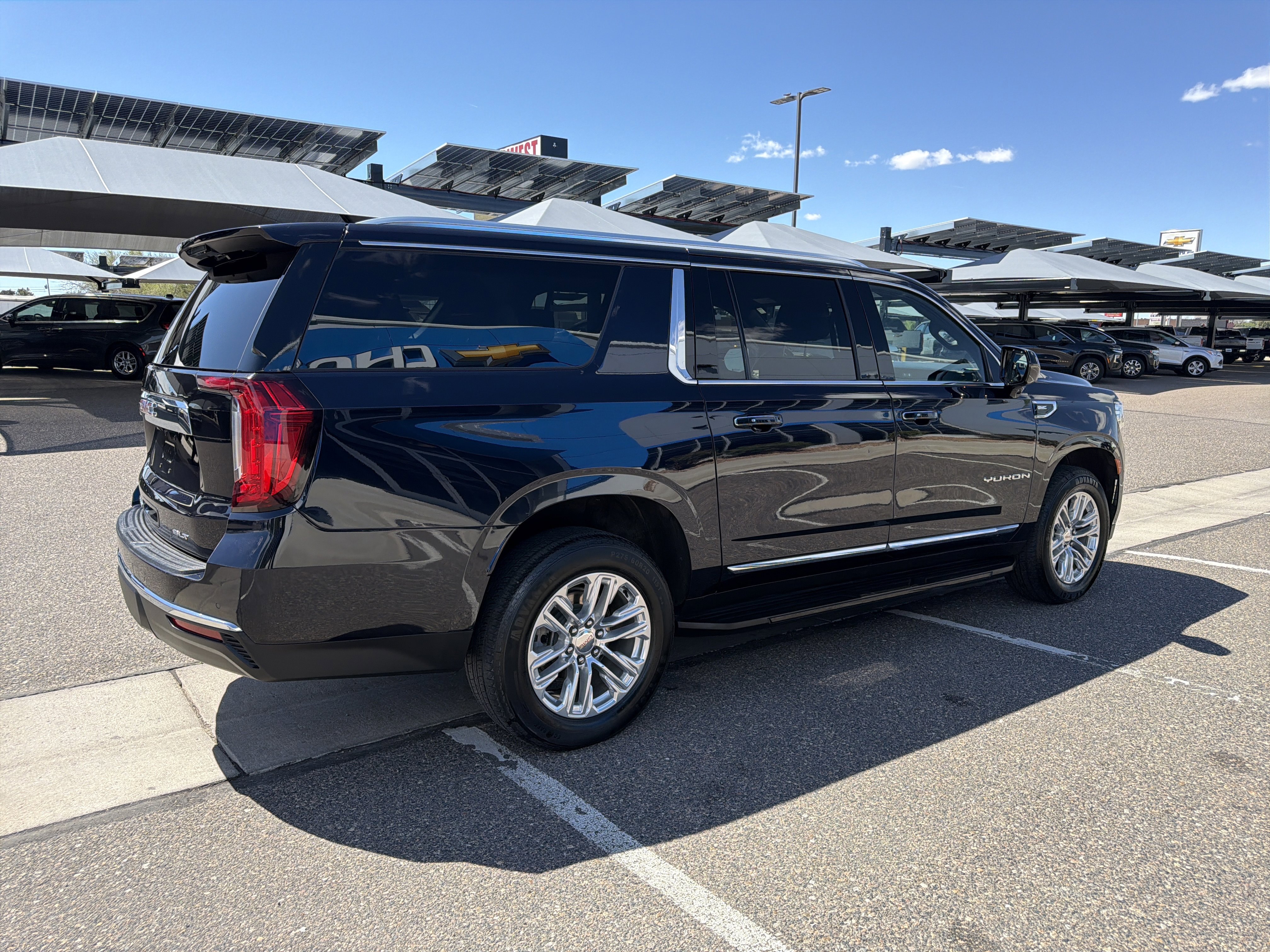 Used 2024 Midnight Blue Metallic GMC SLT image 5
