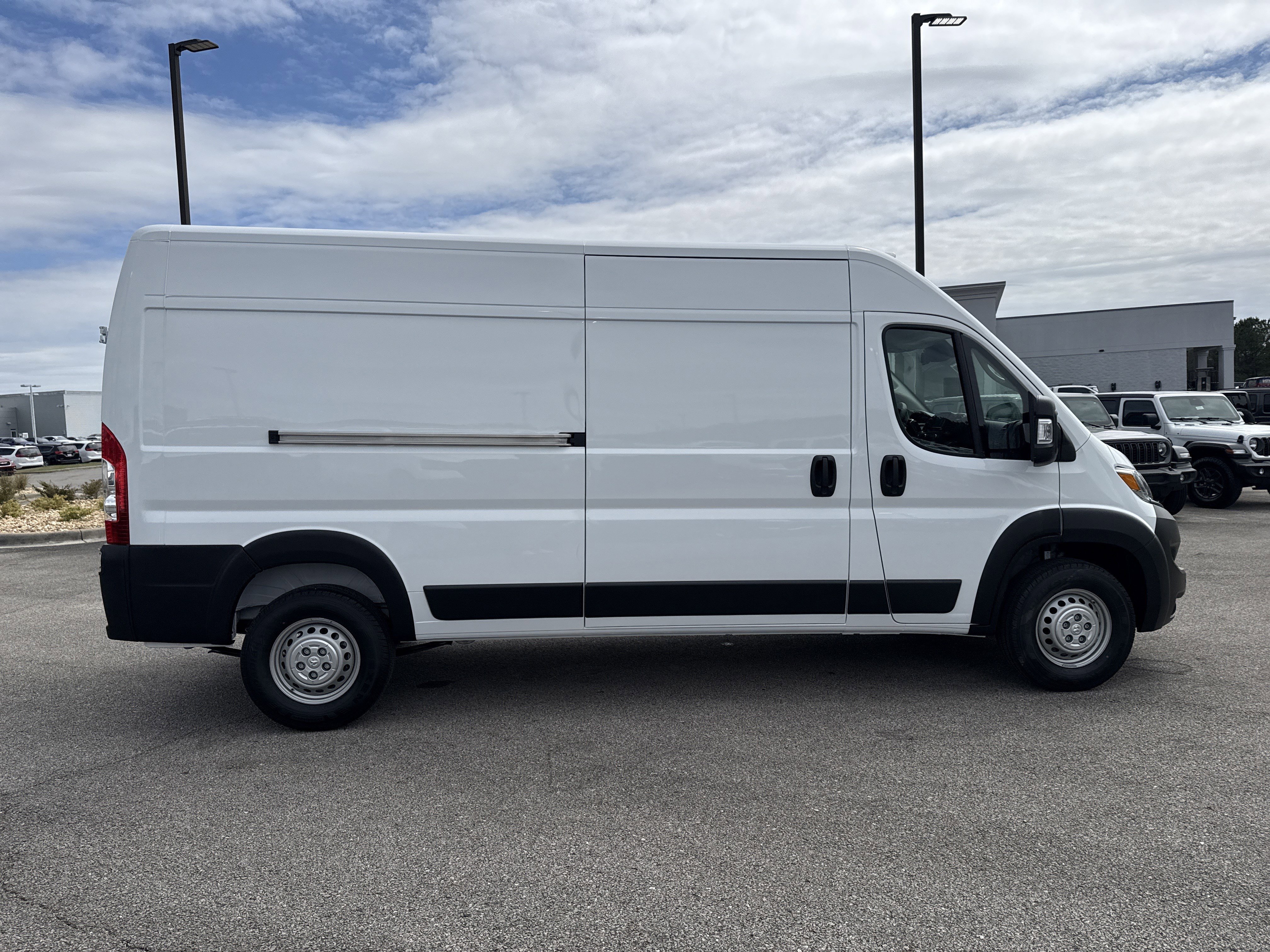 New 2026 Bright White Clearcoat RAM High Roof image 8