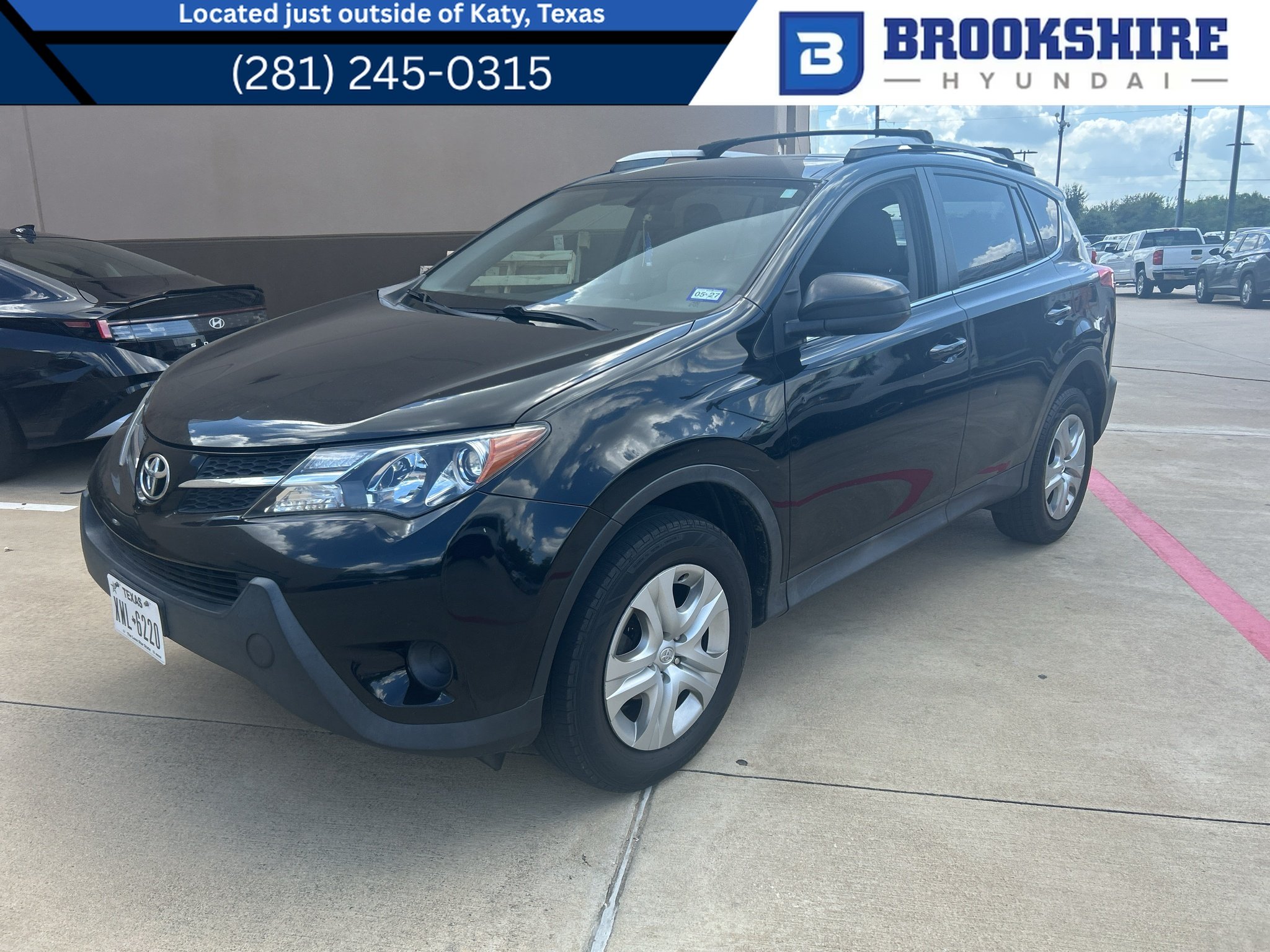 Used 2015 Black Toyota LE image 1