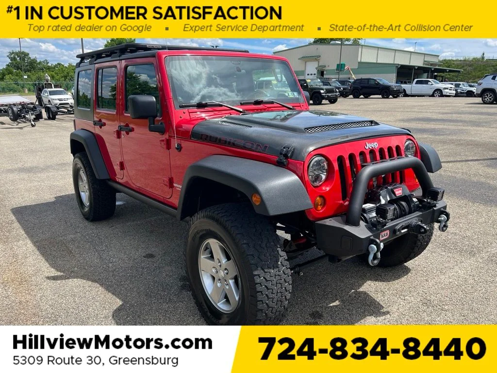 Used 2010 Flame Red Jeep Unlimited Rubicon image 7