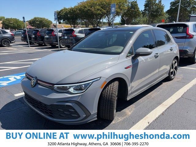 Used 2024 Graphite Gray/Black Roof Volkswagen SE image 1