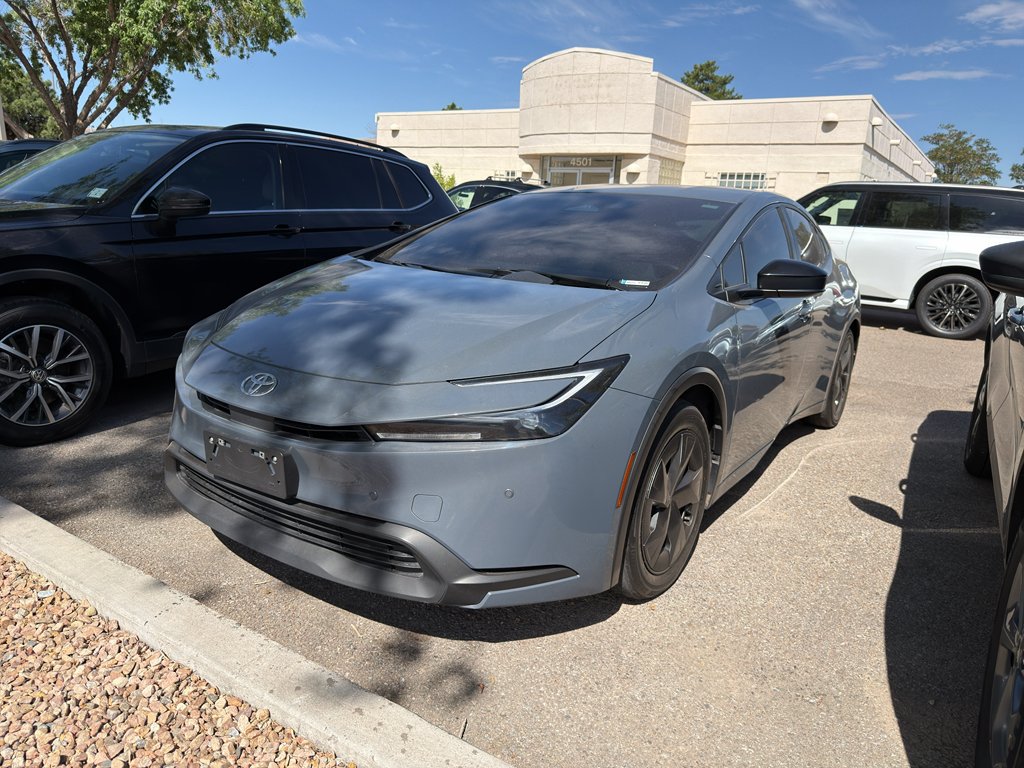 Used 2023 Reservoir Blue Toyota LE image 1